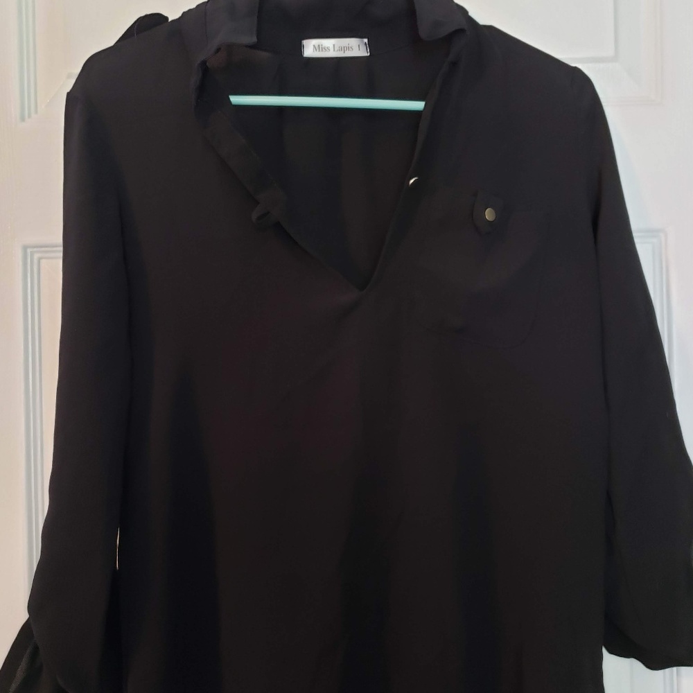 black woman shirt gold buttons